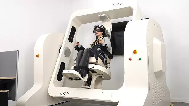 A full-enclosure multi-axis rotary chair system designed for motion sickness assessment and vestibular rehabilitation, providing controlled motion stimuli for sensory conflict processing